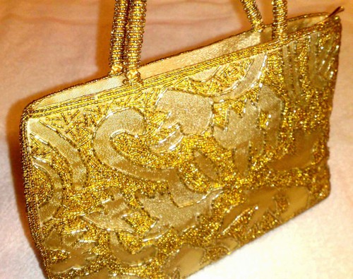 Borsetta a mano con corallini